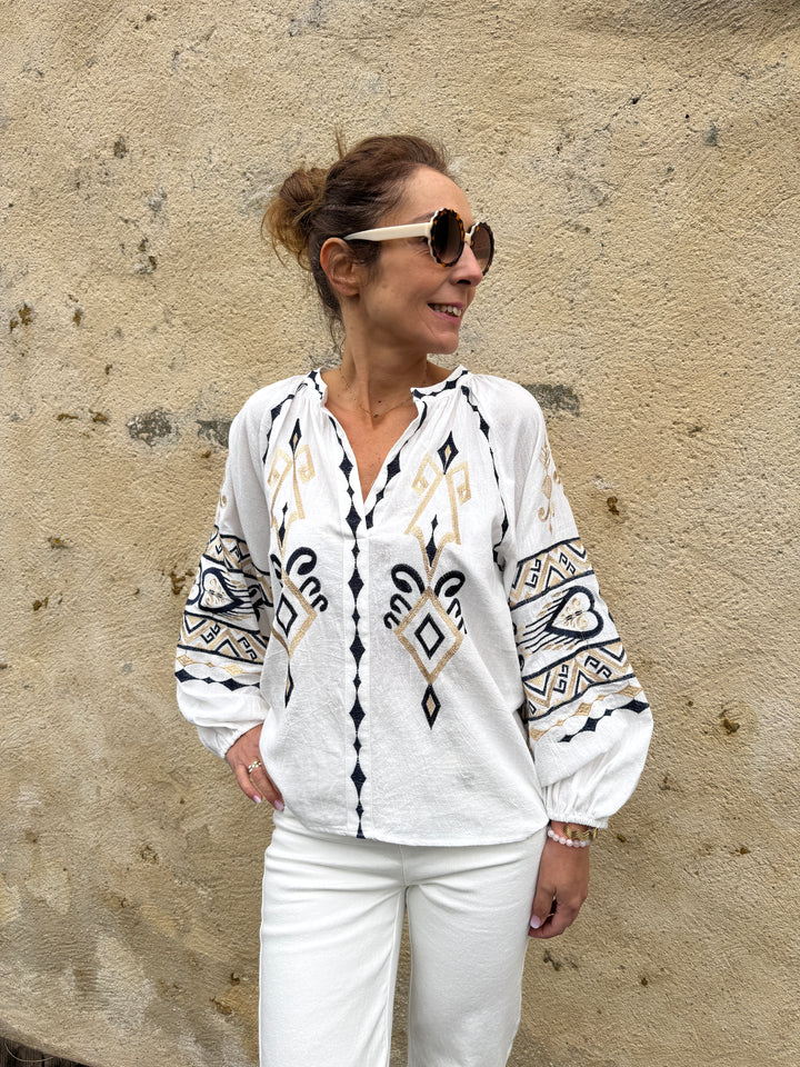 Blouse blanche broderies marine et et or EVA